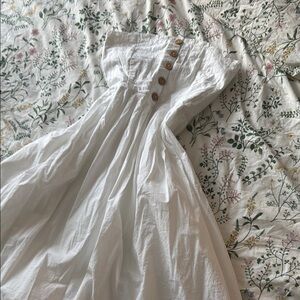 Free People. Elegant White Dress with Button Detail